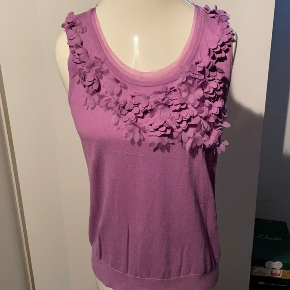 Very cute summer blouse or could be worn under a jacket sleeveless